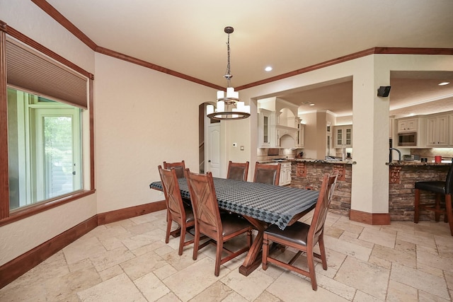 42 Lake Sterling Gate Dr, Spring, TX 77379 - dining space with stone tile flooring, ornamental molding, a chandelier, and recessed lighting