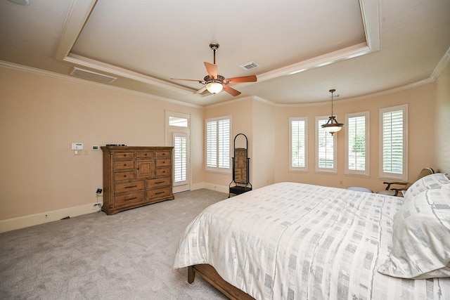 42 Lake Sterling Gate Dr, Spring, TX 77379 - bedroom with a raised ceiling, light carpet, crown molding, and a ceiling fan