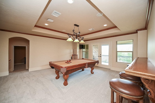 42 Lake Sterling Gate Dr, Spring, TX 77379 - playroom featuring a raised ceiling, arched walkways, billiards table, light carpet, and ornamental molding