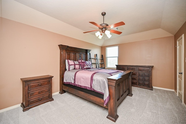 42 Lake Sterling Gate Dr, Spring, TX 77379 - bedroom with light colored carpet, vaulted ceiling, and a ceiling fan