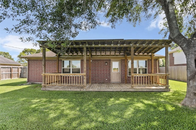 3445 Van Ness Dr, Alvin, TX 77511 - rear view of house featuring a pergola, a wooden deck, and brick siding