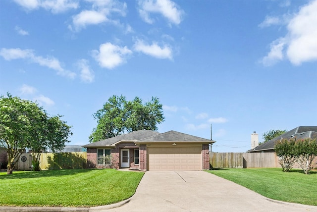 3445 Van Ness Dr, Alvin, TX 77511 - view of front of house featuring brick siding, an attached garage, and driveway