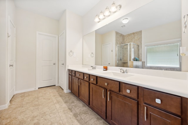 11134 Sun River Falls Dr, Humble, TX 77396 - bathroom with a shower stall and double vanity