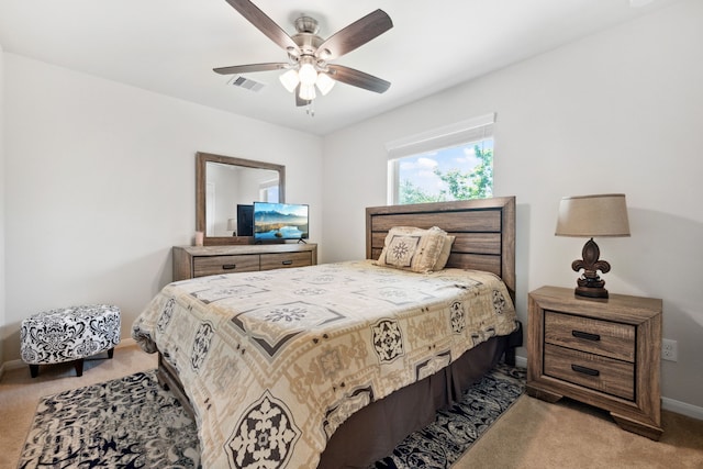 11134 Sun River Falls Dr, Humble, TX 77396 - bedroom with light carpet and ceiling fan