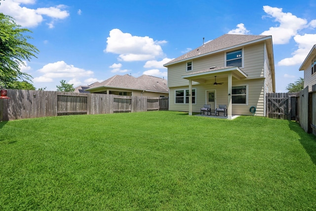 11134 Sun River Falls Dr, Humble, TX 77396 - rear view of house with a fenced backyard, a ceiling fan, a patio, and a shingled roof