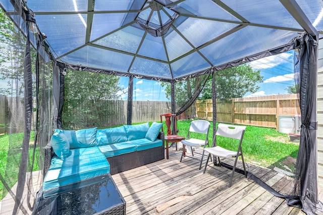 18446 N Willow Bluff Rd, Katy, TX 77449 - wooden deck with an outdoor living space and a fenced backyard