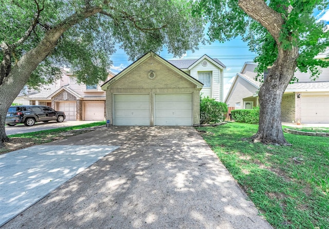 18446 N Willow Bluff Rd, Katy, TX 77449 - townhome / multi-family property featuring brick siding and concrete driveway