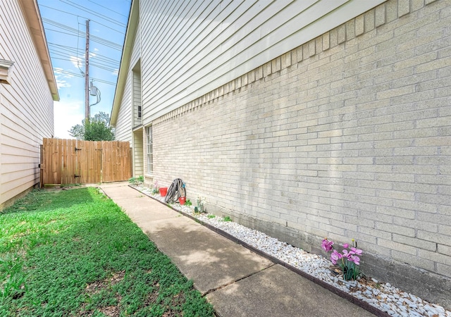 18446 N Willow Bluff Rd, Katy, TX 77449 - view of yard with a gate