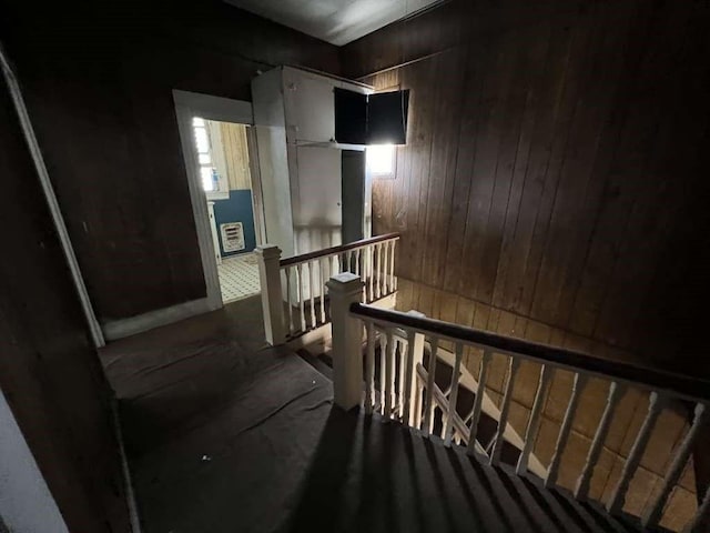 1511 37th St, Galveston, TX 77550 - staircase with wood walls