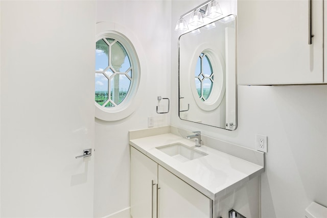 2425 E Seaside Dr, Galveston, TX 77550 - bathroom with vanity and healthy amount of natural light