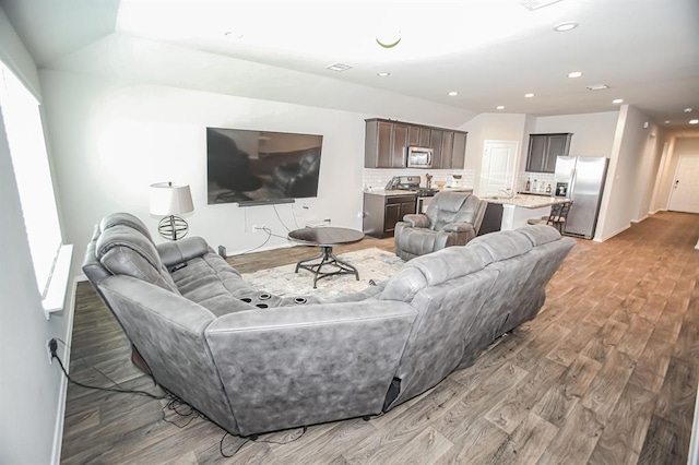 919 Bright Lotus Ln, Rosharon, TX 77583 - living area featuring light wood-style floors and recessed lighting