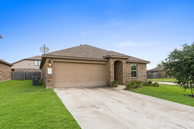 919 Bright Lotus Ln, Rosharon, TX 77583 - ranch-style house featuring brick siding, a garage, concrete driveway, and a shingled roof