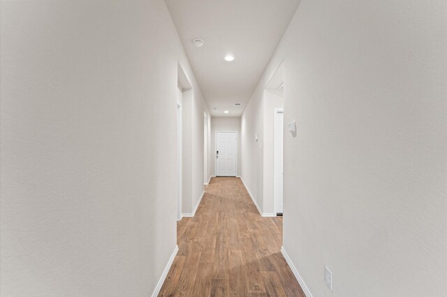 919 Bright Lotus Ln, Rosharon, TX 77583 - hallway with recessed lighting and wood finished floors