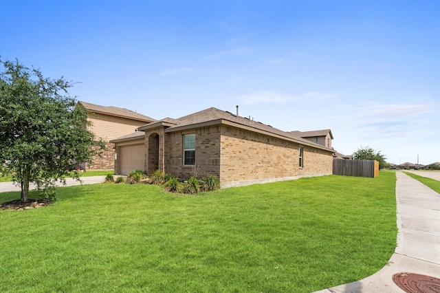 919 Bright Lotus Ln, Rosharon, TX 77583 - view of property exterior with brick siding and a garage