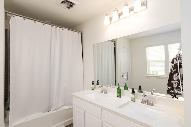 4523 Lally Brook Ct, Katy, TX 77493 - full bathroom featuring double vanity and shower / bathtub combination with curtain