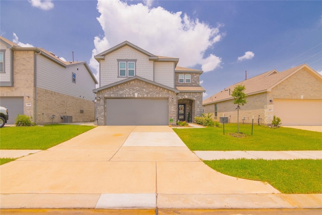 4523 Lally Brook Ct, Katy, TX 77493 - view of front of house with a garage, concrete driveway, a front yard, and brick siding