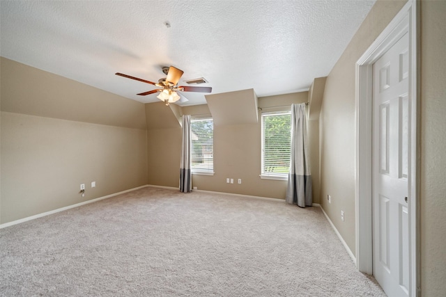 19011 Oakway Dr, Spring, TX 77388 - bonus room featuring ceiling fan, light carpet, a textured ceiling, and lofted ceiling