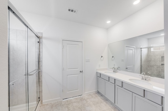 1235 Buffalo Run, Tomball, TX 77375 - full bathroom with a stall shower, double vanity, and recessed lighting