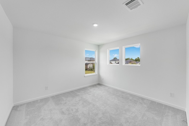 1235 Buffalo Run, Tomball, TX 77375 - unfurnished room featuring carpet floors and recessed lighting