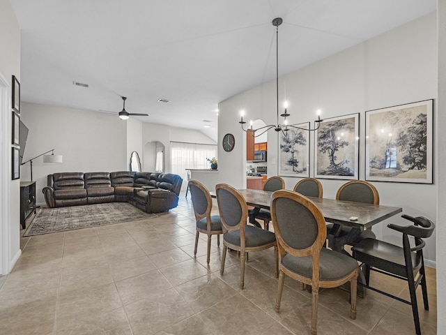 13022 Echo Landing Dr, Houston, TX 77070 - dining area featuring a chandelier, a ceiling fan, and tile patterned flooring