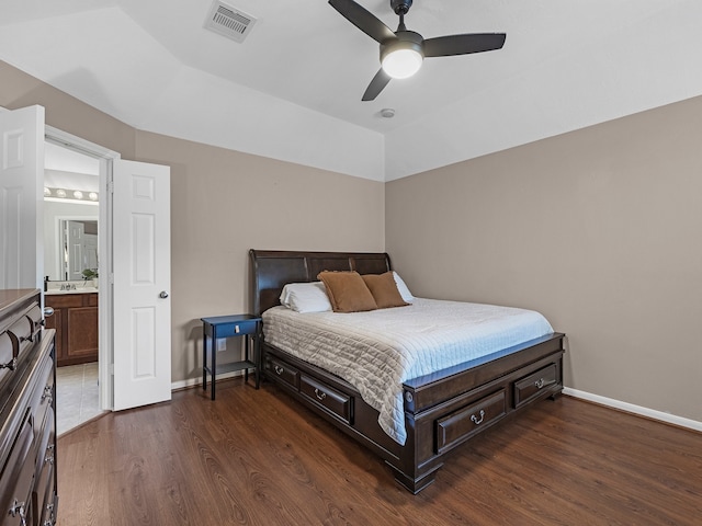 13022 Echo Landing Dr, Houston, TX 77070 - bedroom featuring wood finished floors, a ceiling fan, and ensuite bathroom