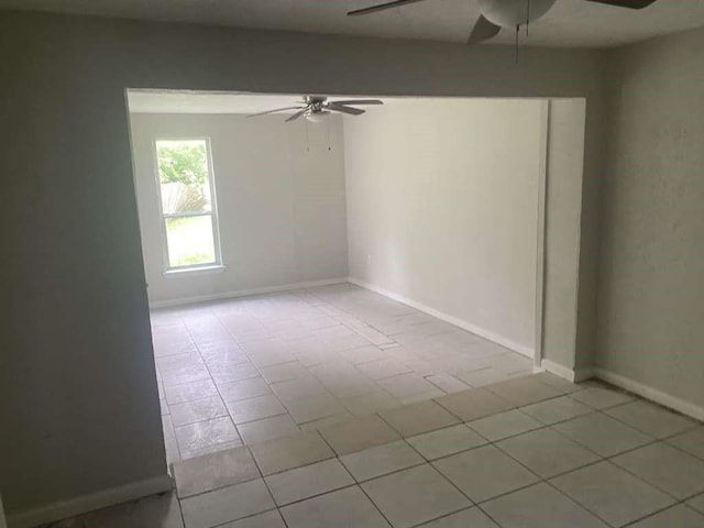 15626 Corsair Rd, Houston, TX 77053 - empty room featuring a ceiling fan and light tile patterned flooring
