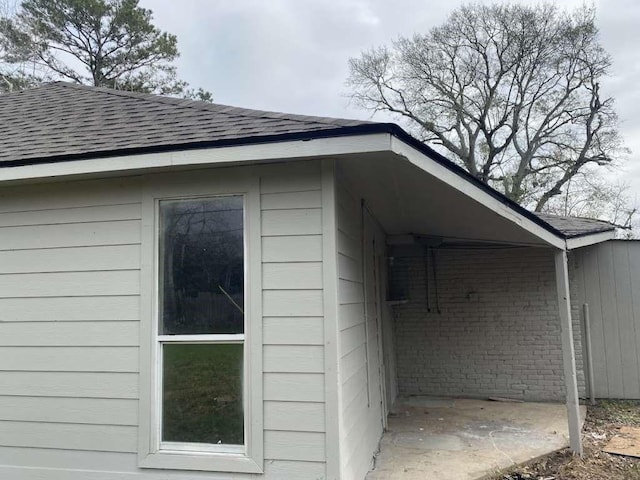 15626 Corsair Rd, Houston, TX 77053 - view of side of property featuring roof with shingles