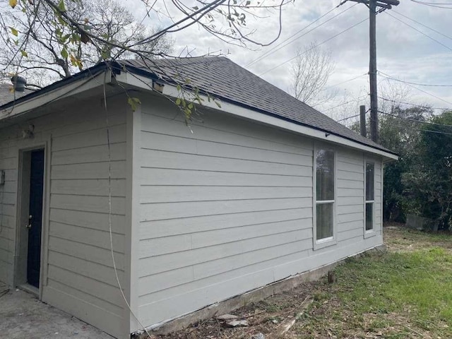 15626 Corsair Rd, Houston, TX 77053 - view of side of home with a shingled roof