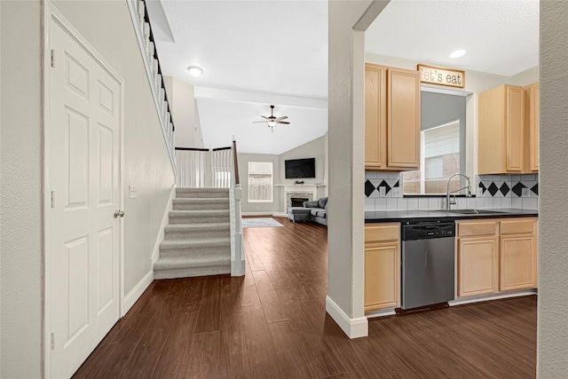 20014 Coyote Ridge Ln, Katy, TX 77449 - kitchen with dishwasher, light brown cabinets, dark countertops, ceiling fan, and dark wood-type flooring