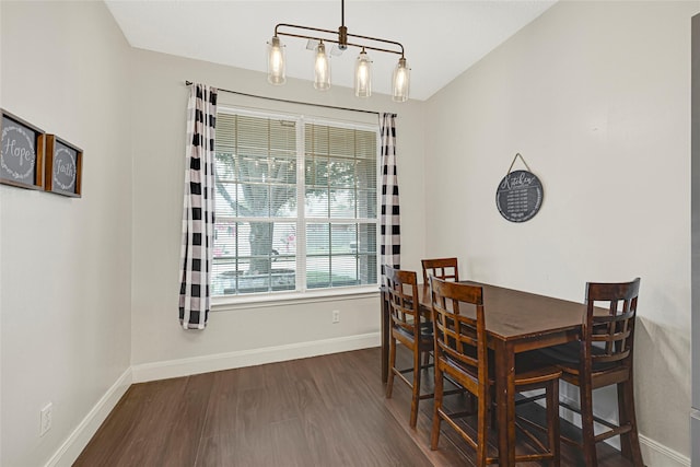 20014 Coyote Ridge Ln, Katy, TX 77449 - dining area featuring dark wood-style flooring and baseboards