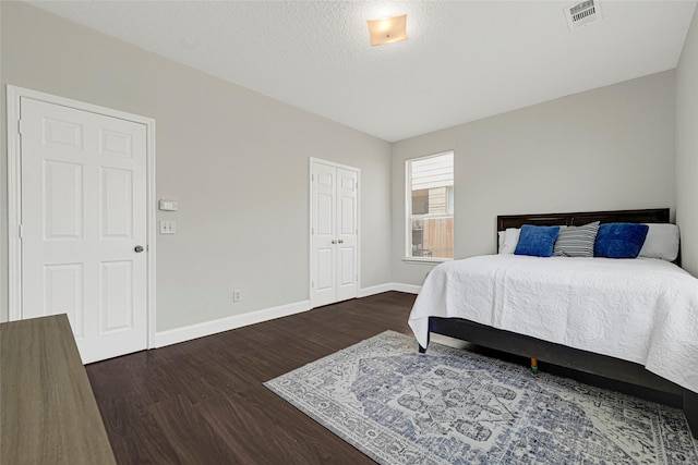 20014 Coyote Ridge Ln, Katy, TX 77449 - bedroom with dark wood finished floors and baseboards