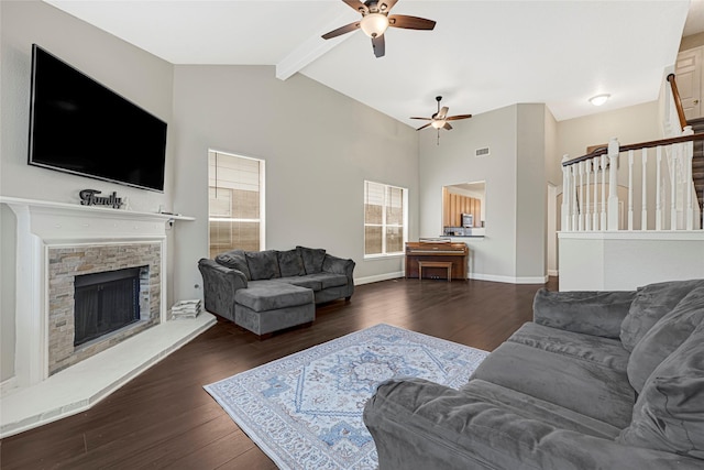 20014 Coyote Ridge Ln, Katy, TX 77449 - living area with ceiling fan, beamed ceiling, wood finished floors, stairway, and a fireplace