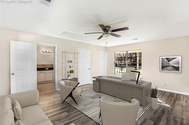 26785 Fm 2090th Rd, Splendora, TX 77372 - living room featuring attic access, ceiling fan, and wood finished floors