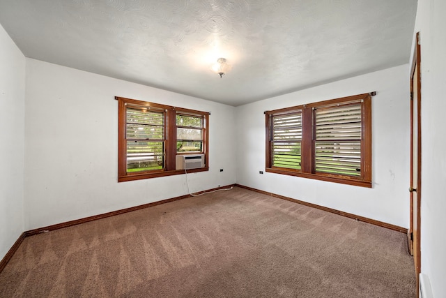 523 Main St, La Marque, TX 77568 - carpeted spare room with baseboards and cooling unit