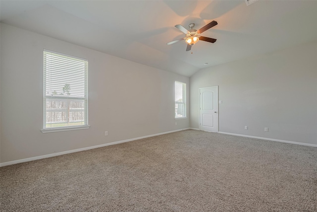 8326 Erasmus Landing Ct, Houston, TX 77044 - empty room with carpet flooring, a ceiling fan, and vaulted ceiling
