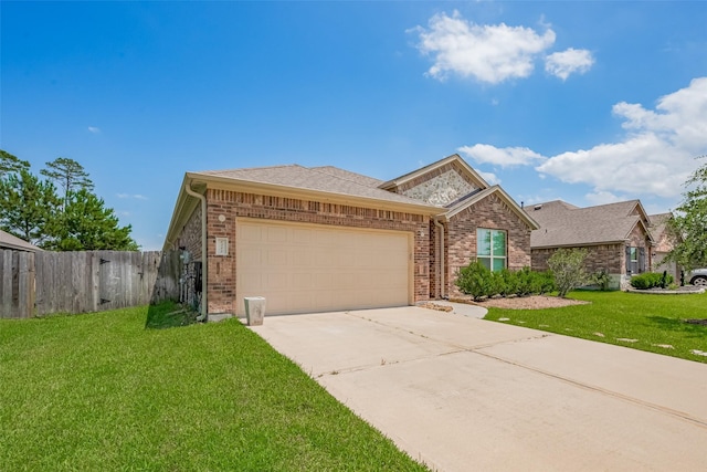 8326 Erasmus Landing Ct, Houston, TX 77044 - view of front of property with an attached garage, brick siding, and concrete driveway