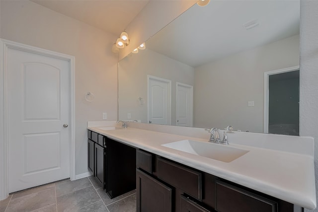 8326 Erasmus Landing Ct, Houston, TX 77044 - bathroom with double vanity and baseboards