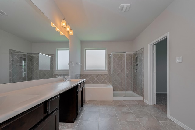 8326 Erasmus Landing Ct, Houston, TX 77044 - full bath featuring a bath, double vanity, a shower stall, and tile patterned flooring