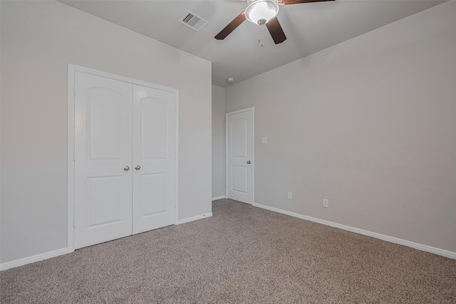 8326 Erasmus Landing Ct, Houston, TX 77044 - unfurnished bedroom with carpet flooring, a closet, and ceiling fan