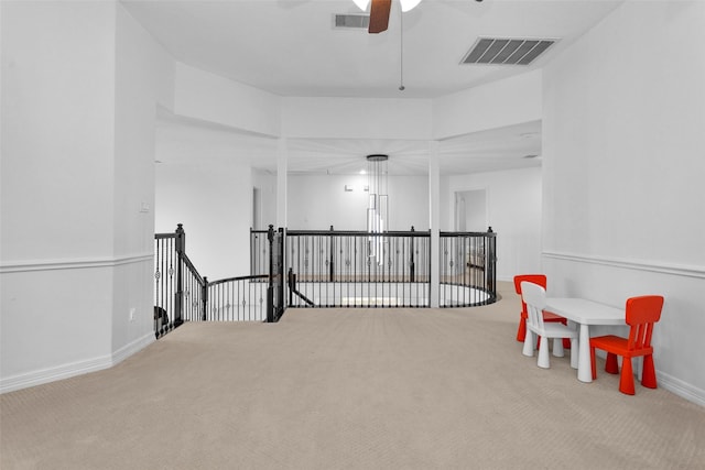 8422 Misty Mountain Trail Ln, Spring, TX 77389 - living area with an upstairs landing, carpet flooring, and a ceiling fan