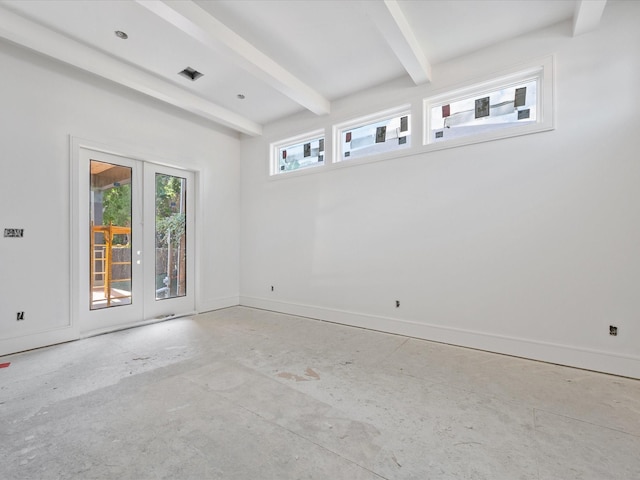 1718 White Oak Dr, Houston, TX 77009 - empty room featuring beam ceiling and baseboards