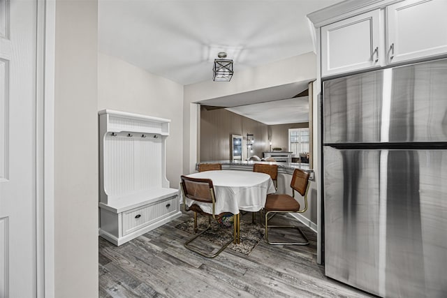 5406 Hazel St, Baytown, TX 77521 - dining area featuring wood finished floors and baseboards