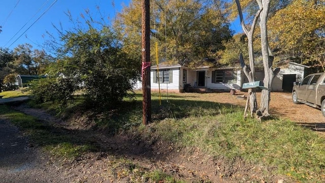 1201 S 12th St, Longview, TX 75602 - view of front facade featuring a storage shed