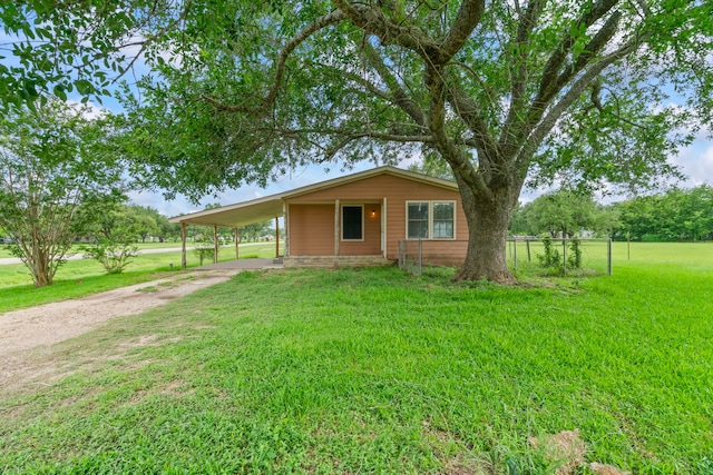 501 Carlson Cir, Wharton, TX 77488 - view of front facade with driveway and an attached carport