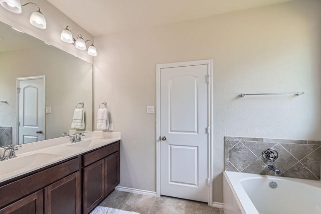 24327 Hampton Terrace Ln, Spring, TX 77389 - bathroom with double vanity and a bath