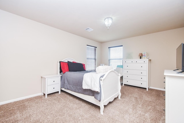8218 Polaris Point Ln, Cypress, TX 77433 - bedroom featuring light colored carpet and baseboards