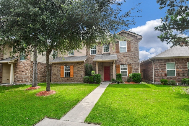 8218 Polaris Point Ln, Cypress, TX 77433 - view of front of property with a front lawn and brick siding
