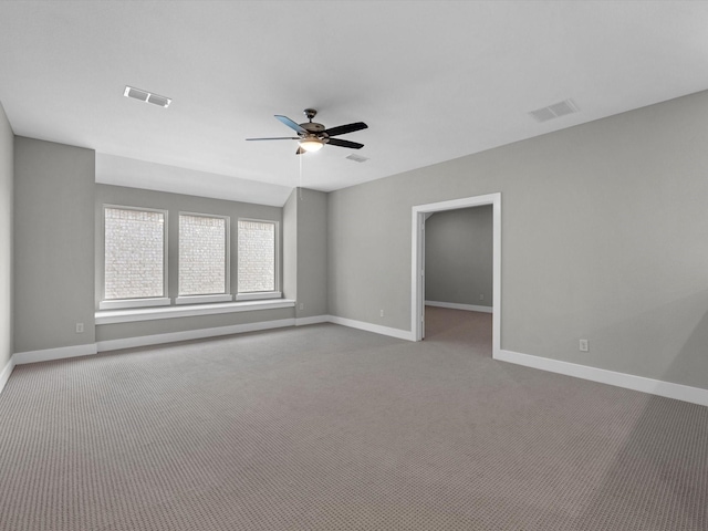 14316 Moonlit Creek Ct, Montgomery, TX 77316 - carpeted empty room featuring baseboards and ceiling fan