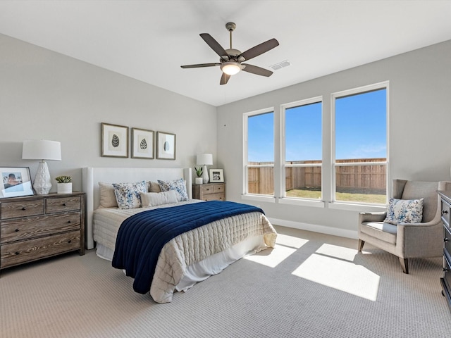 14316 Moonlit Creek Ct, Montgomery, TX 77316 - bedroom featuring carpet floors, baseboards, and a ceiling fan