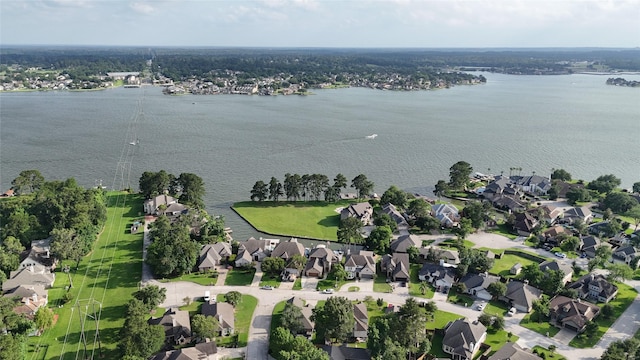 2818 Lake Forest Dr, Montgomery, TX 77356 - aerial view of property's location featuring a nearby body of water and nearby suburban area